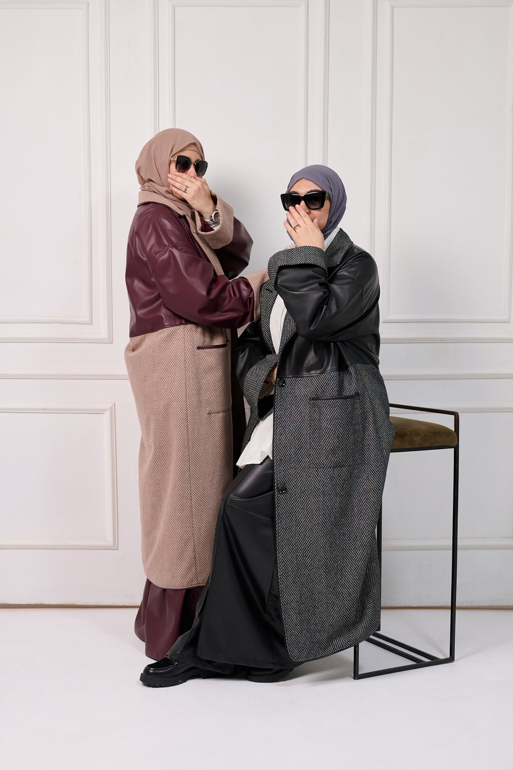 Modern coat with refined leather details for a polished look